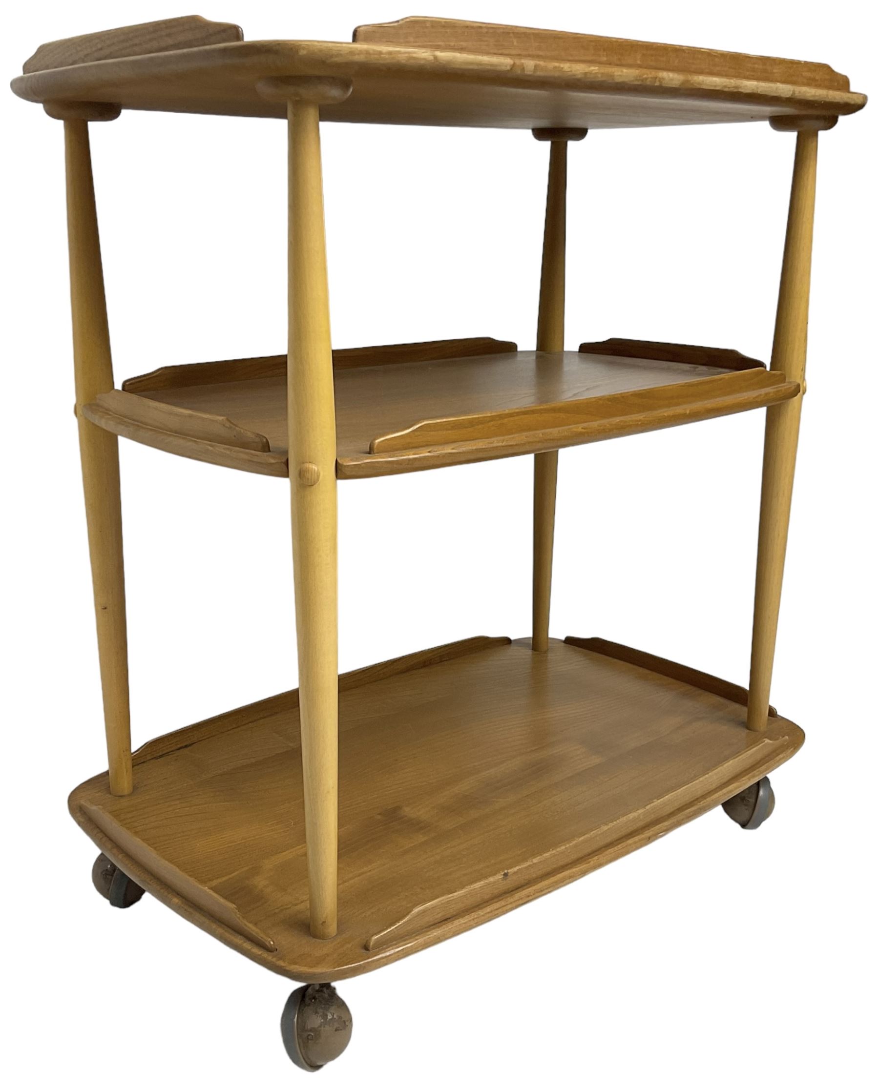 Ercol - mid-20th century light elm 'three tier tea trolley, on castors