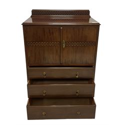 Early 20th century mahogany tallboy, double cupboard over three drawers, on ball and claw carved cabriole feet