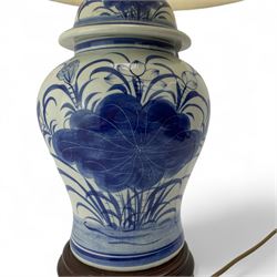 Contemporary Chinese blue and white table lamp, of baluster form with hardwood plinth and shade, H68cm overall 