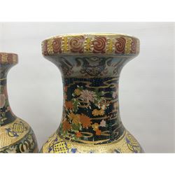 Pair of modern Satsuma vases of baluster form, decorated with figures in within river landscapes and floral borders, highlighted in gilt, H60cm