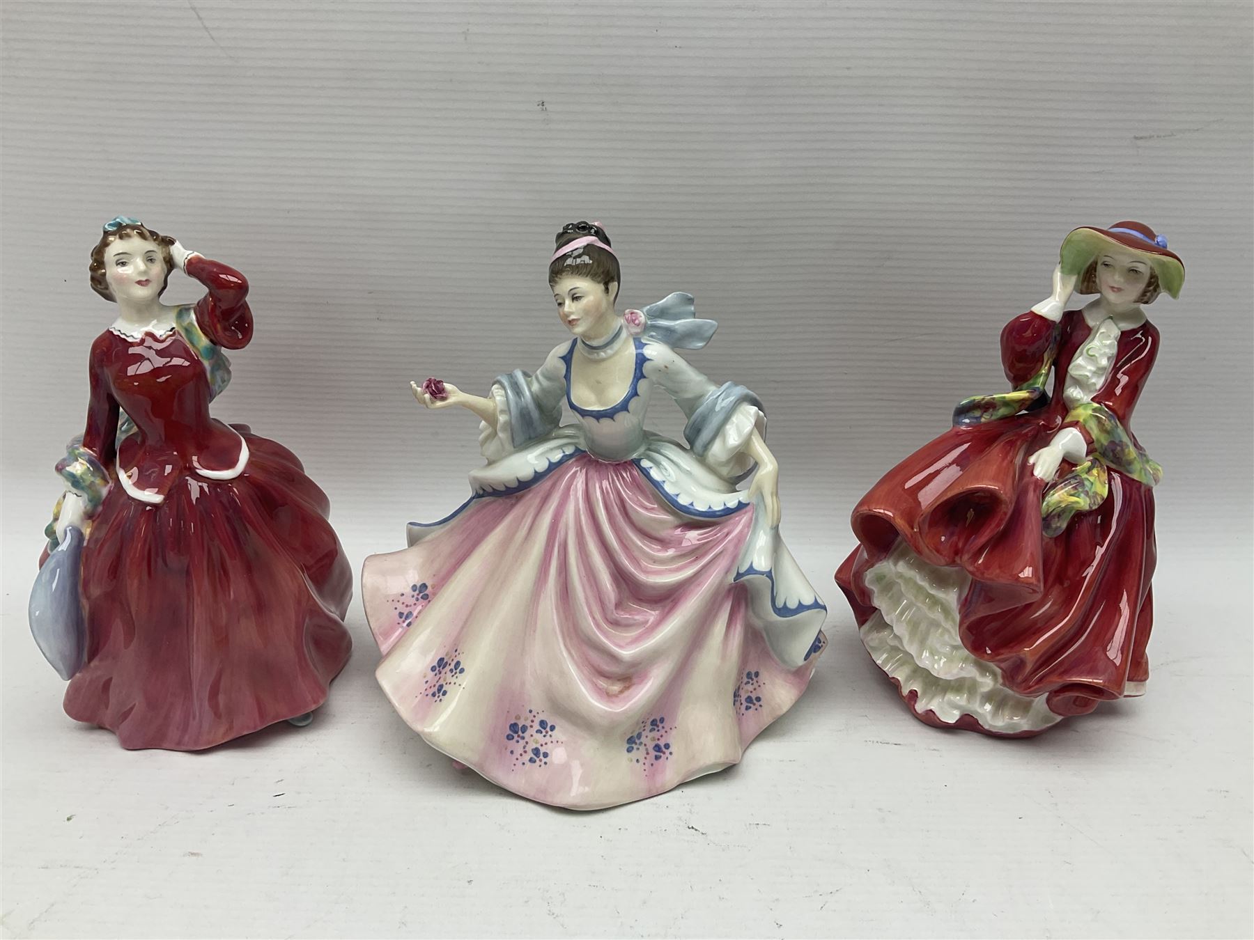 Eight Royal Doulton figures, including Ascot HN2356, Rebecca HN2805, Top o the Hill HN1833 etc