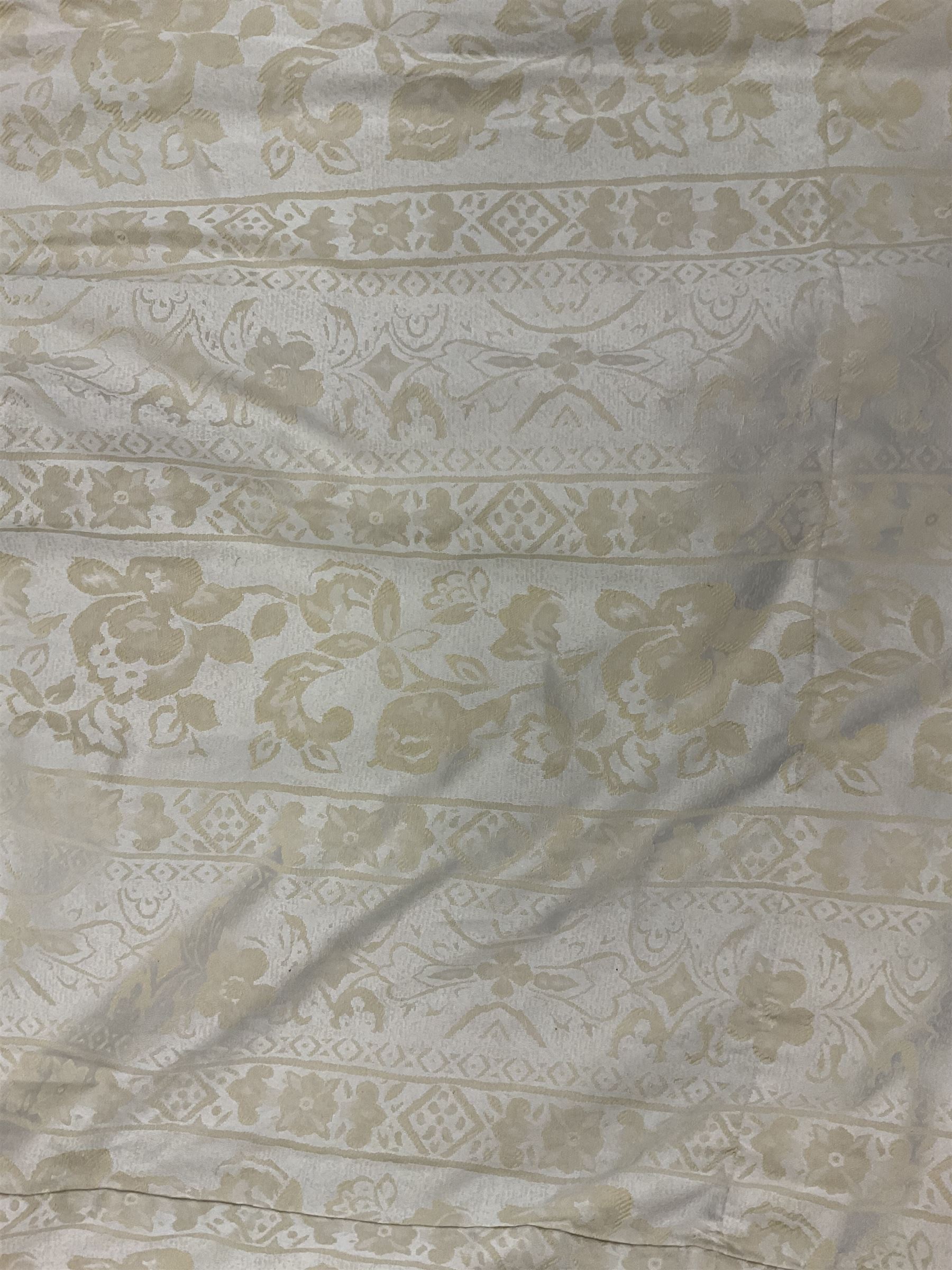 Two pairs of curtains - cream fabric decorated with foliate pattern (width at header - 216cm, drop - 232cm); cream fabric decorated with lozenges (width at header - 126cm, drop - 230cm), and two pelmets 