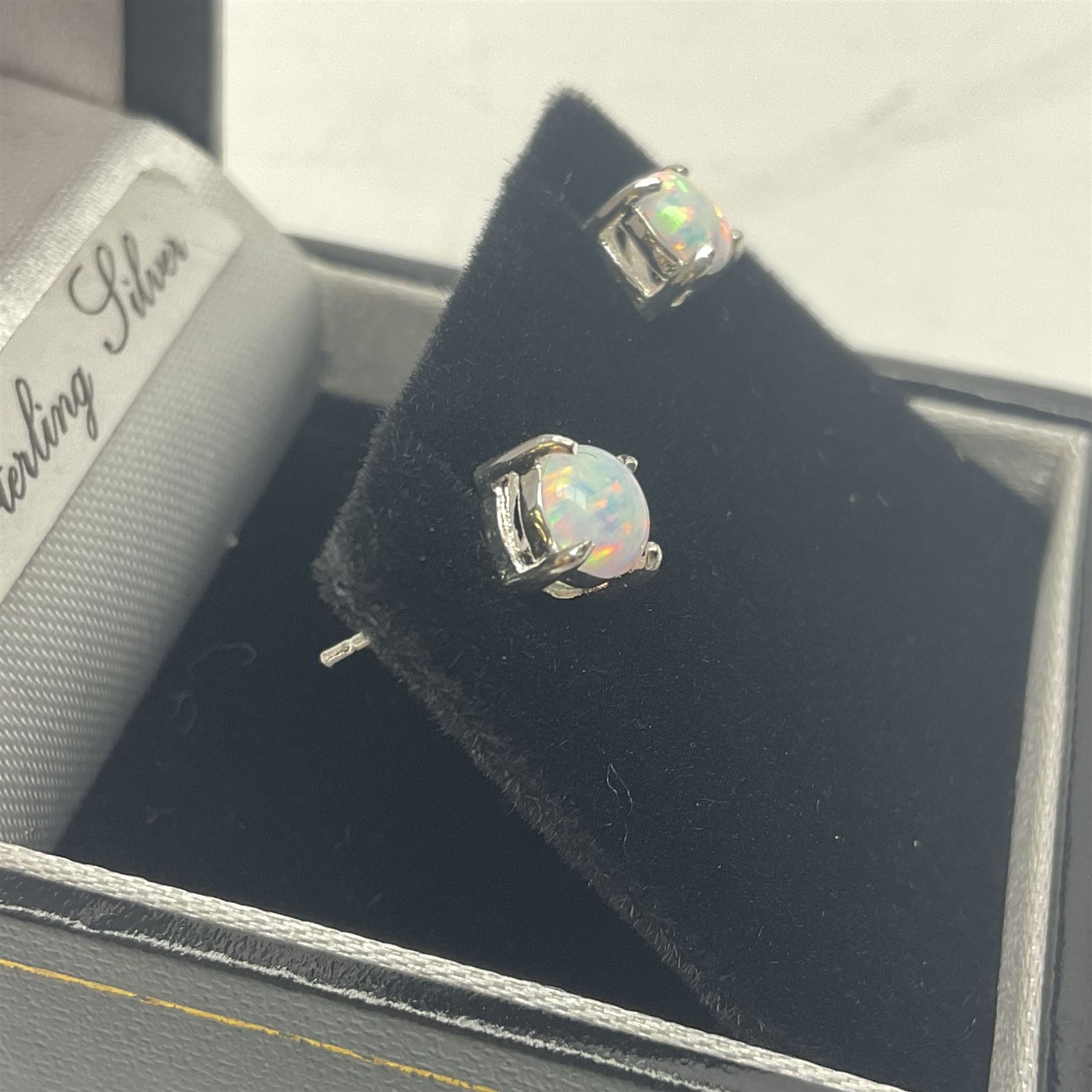 Pair of silver opal stud earrings, stamped 925, boxed 