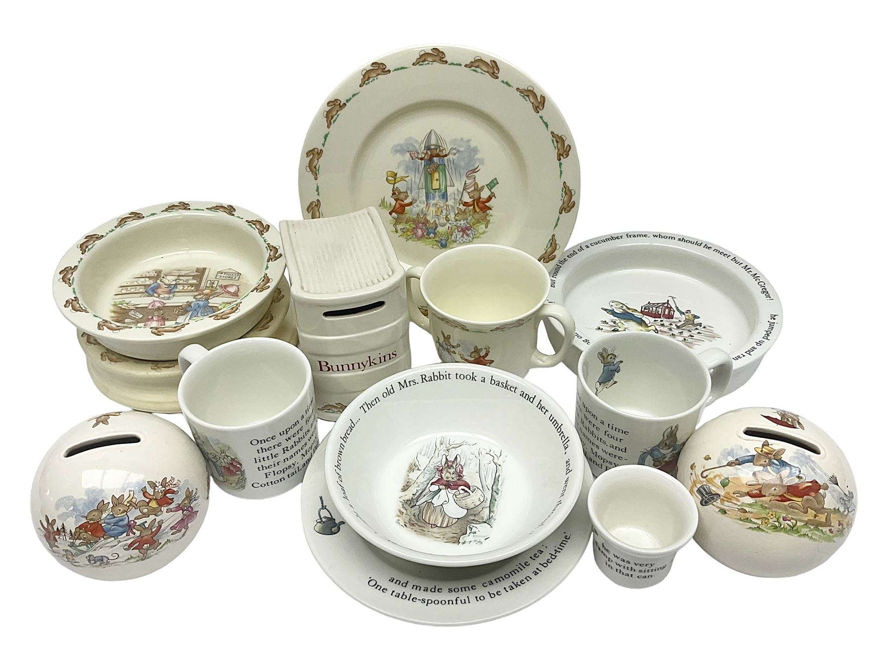 Collection of Royal Doulton Bunnykins and Wedgwood Peter Rabbit nursery ware, including cups, bowls, money boxes, etc 