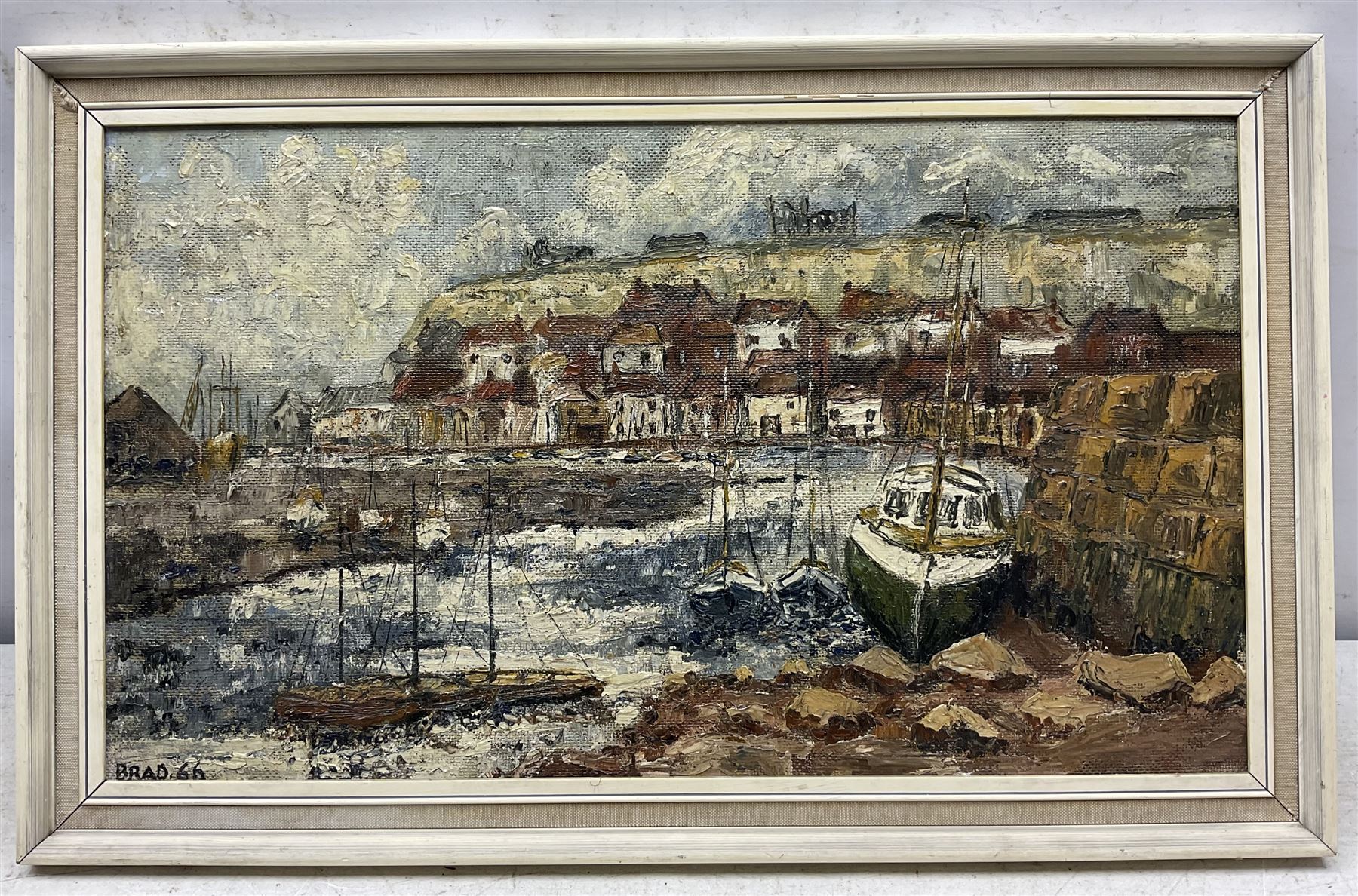 Brad (British Mid-20th Century): 'Whitby - North Yorks', oil on board signed and dated '66, titled verso 31cm x 53cm 