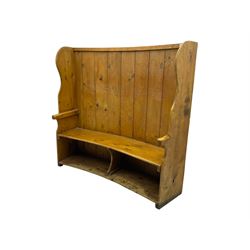 19th century pine barrel back settle, bowed boarded back on shaped end supports, with upholstered squab cushion 