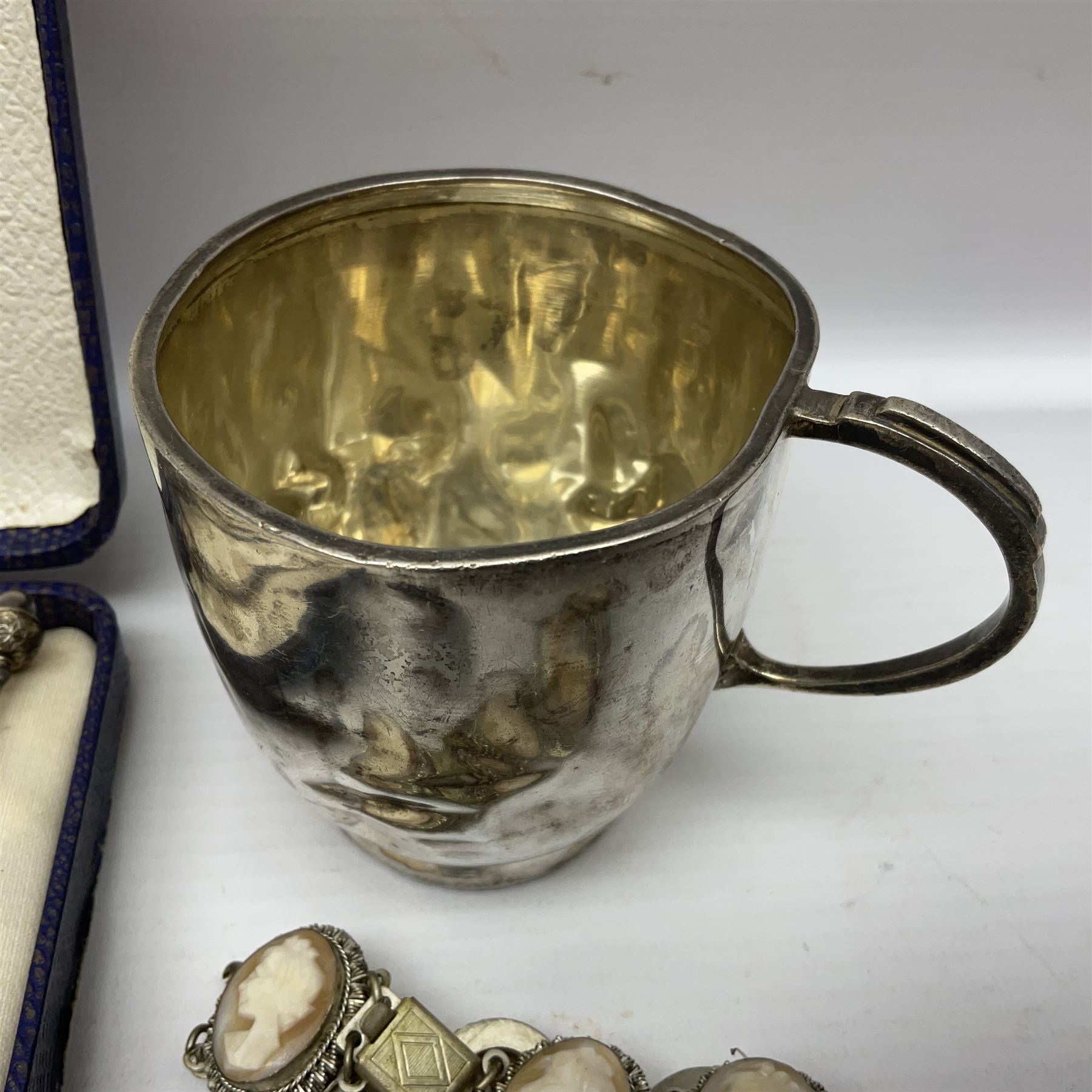 Set of six silver plated cocktail sticks, with acorn finials, hallmarked silver christening cup, silver ring and earrings and a costume jewellery cameo bracelet 