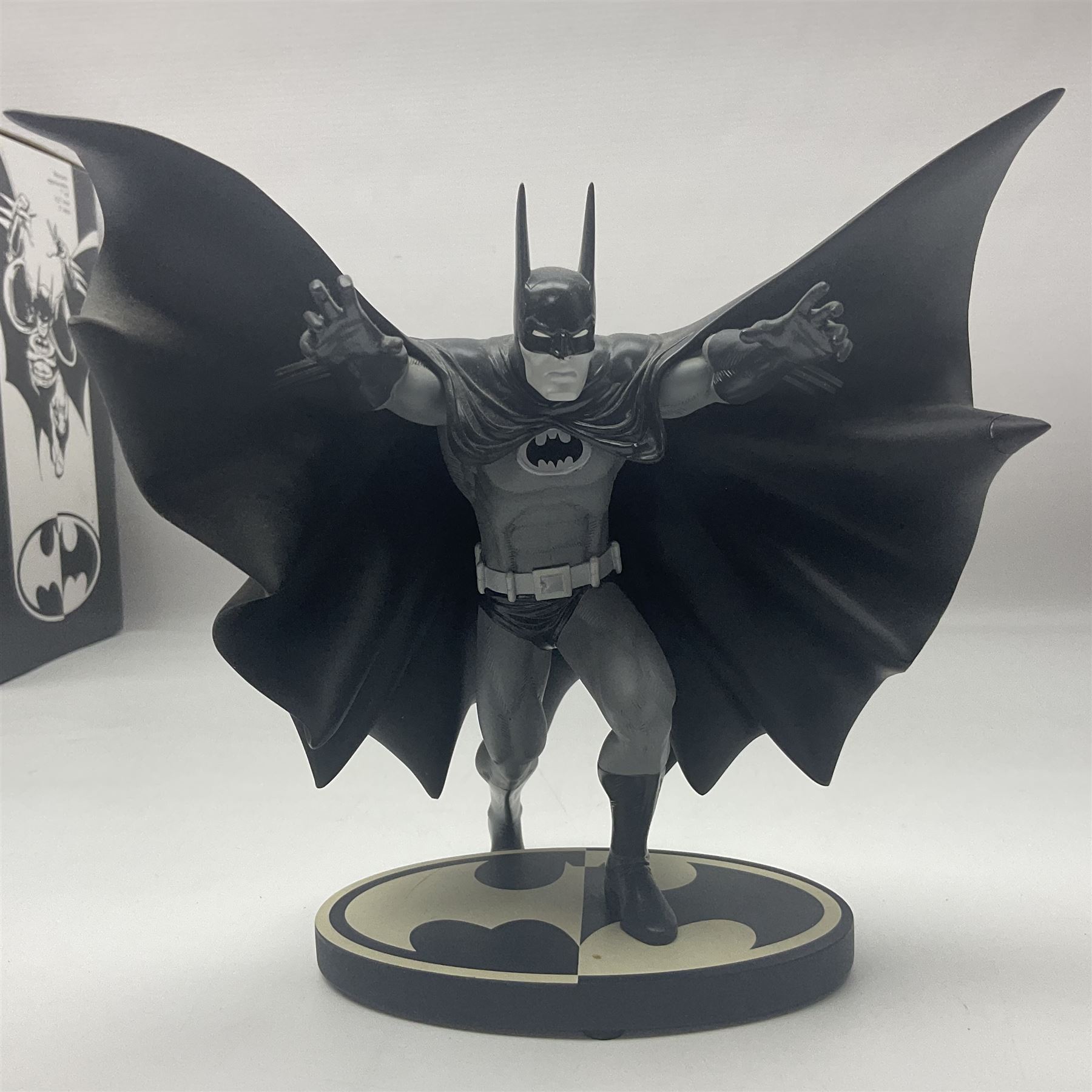 Group of five limited edition DC Direct Black and White Batman hand-painted cold-cast porcelain statues in original boxes, with two similar examples from DC Collectibles 