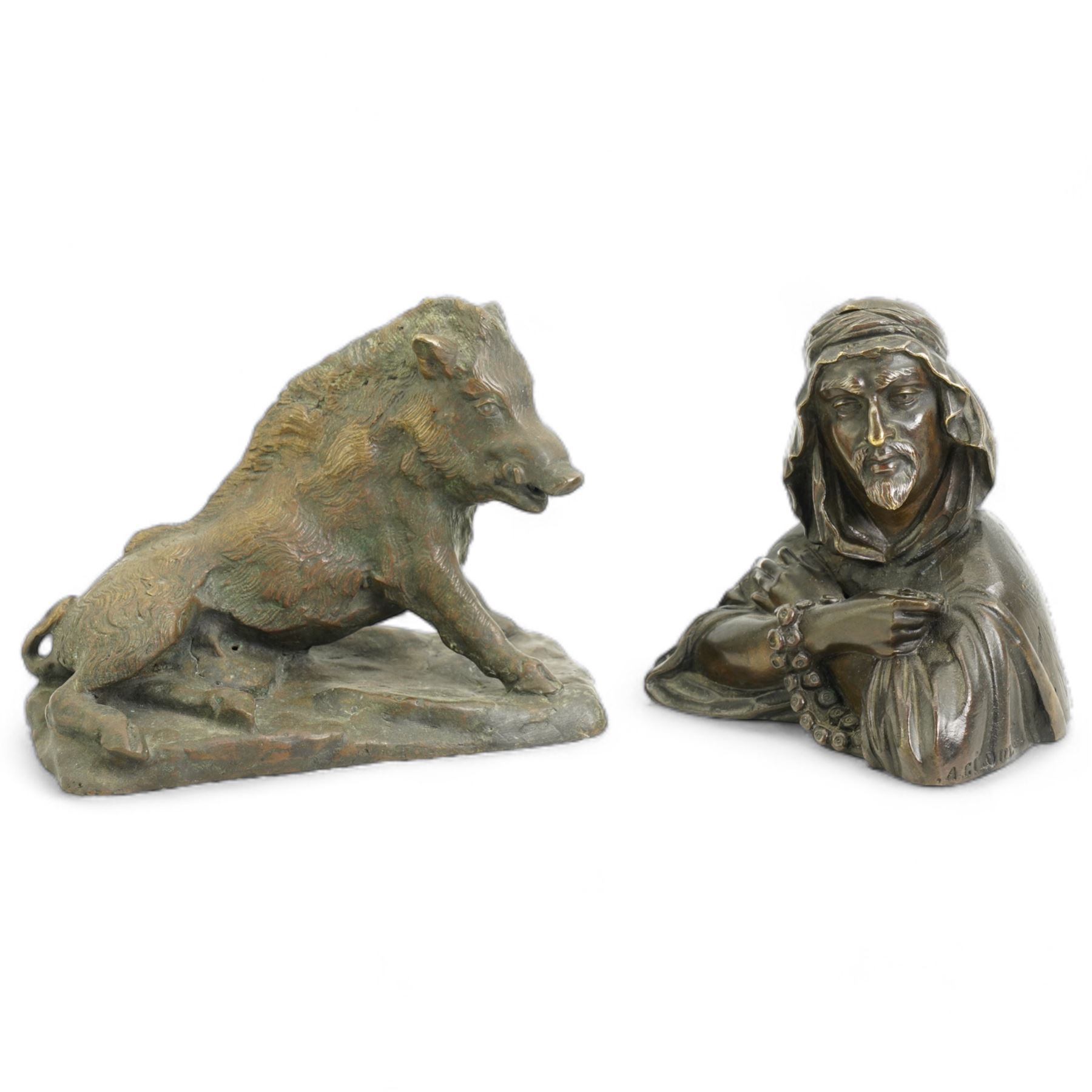 After Alphonse Giroux, patinated bronze inkstand, in the form of an Arab, with hinged headdress, H11cm together with a patinated bronze model of a recumbent boar, L13cm (2)