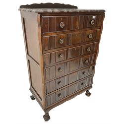 Early 20th century Dutch design mahogany chest, raised back over shaped top, fitted with two short and five long drawers, raised on ball and claw feet