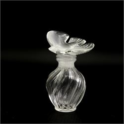 Lalique glass to include three pin dishes surmounted with swans, lovebirds and wren, another figure of a wren on circular base and a Nina Ricci dove perfume bottle, H9cm (5)