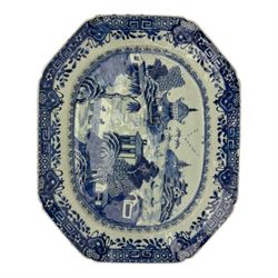 Six 18th century Chinese Export blue and white platters, each of rectangular canted form decorated with various landscape scenes, within foliate borders, max L45cm (6)