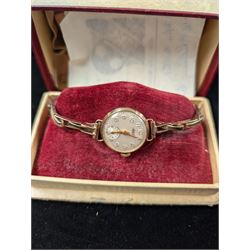 9ct gold cased manual wind ladies Accurist 21 Jewel wristwatch on a 9ct gold spring loaded, boxed 