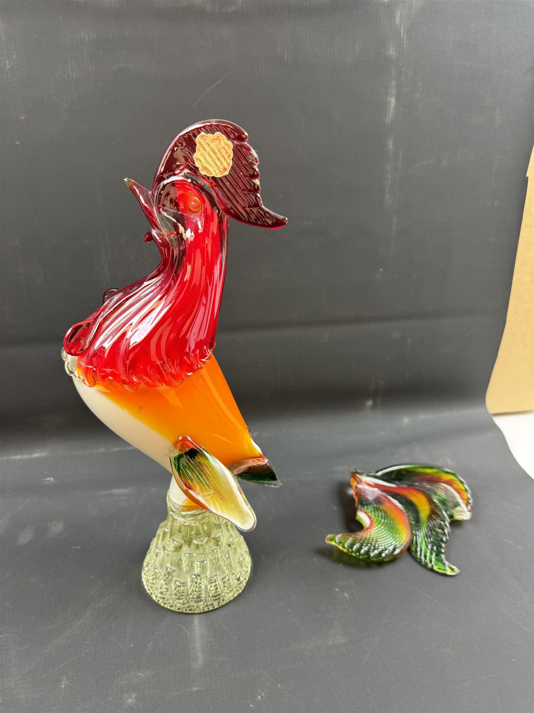 Two Murano glass clowns, together with similar glass figures, including cockerels and fish