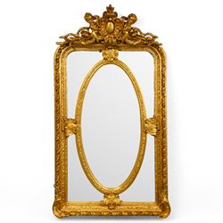 Victorian design gilt composite wall mirror, central cartouche pediment held by flanking p...