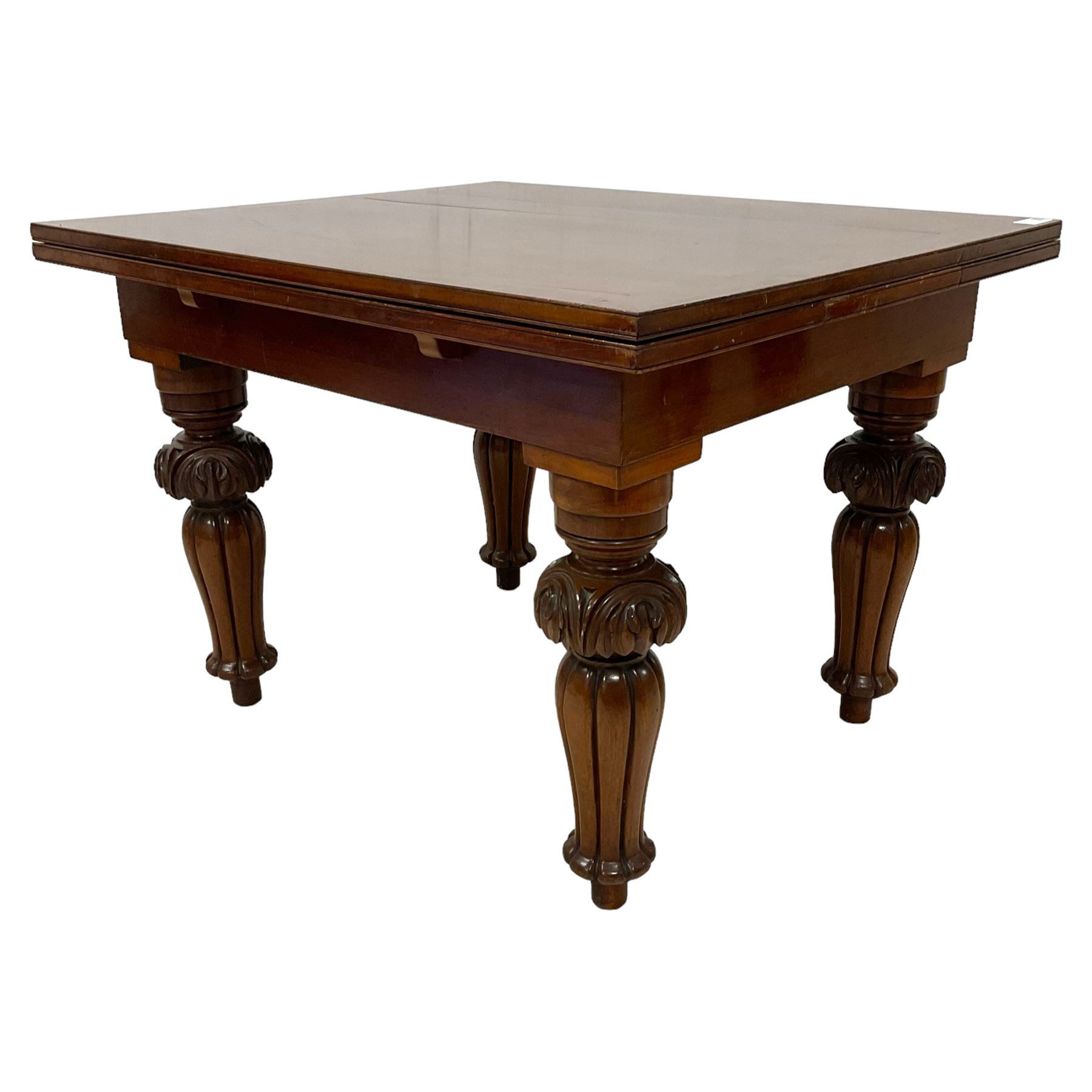 Victorian mahogany draw-leaf extending dining table, rectangular top with two additional leaves, on turned foliage carved and lobe moulded supports