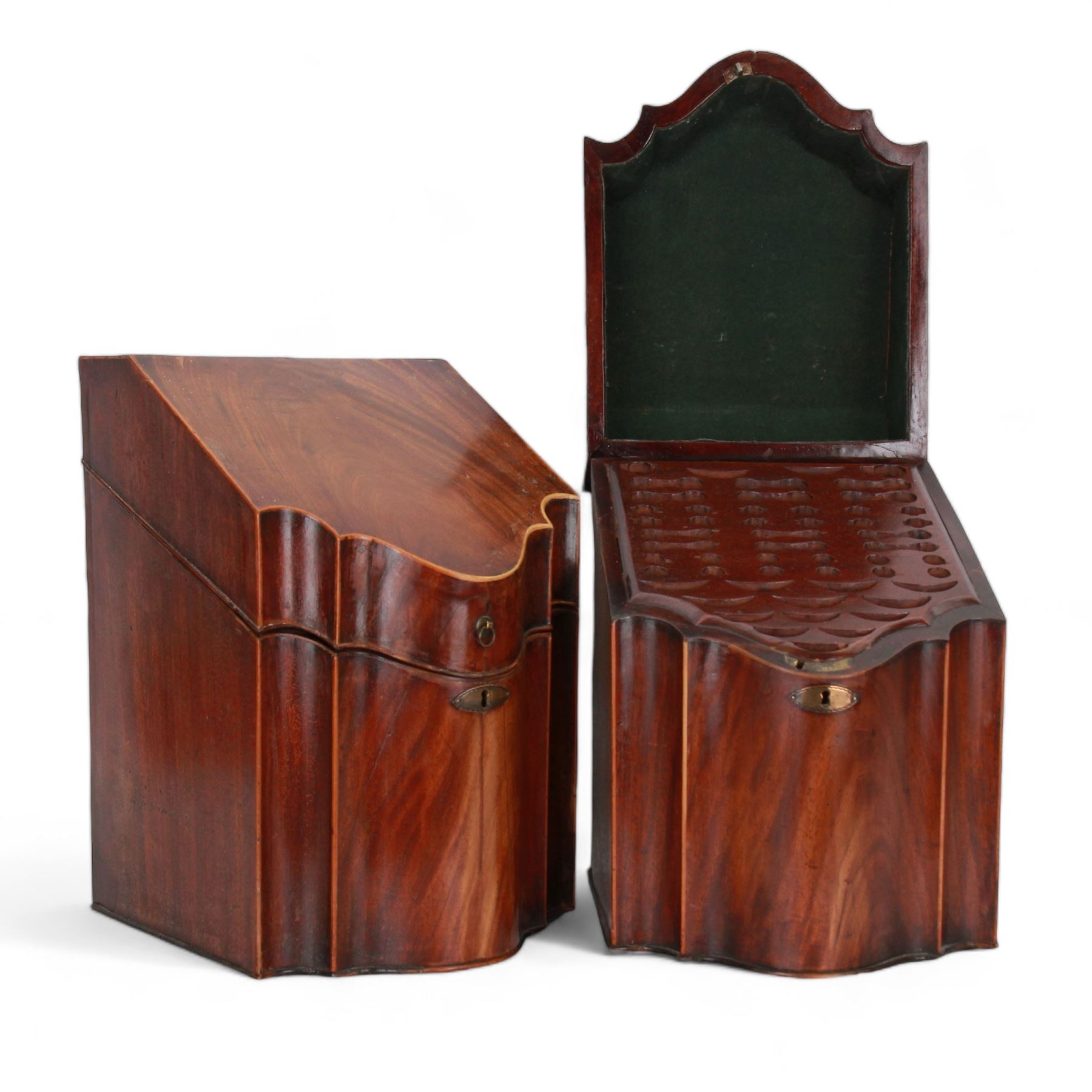 Pair of George III mahogany knife boxes, each of serpentine fronted form with strung detail to the hinged cover and body, opening to reveal a fitted interior, H38cm