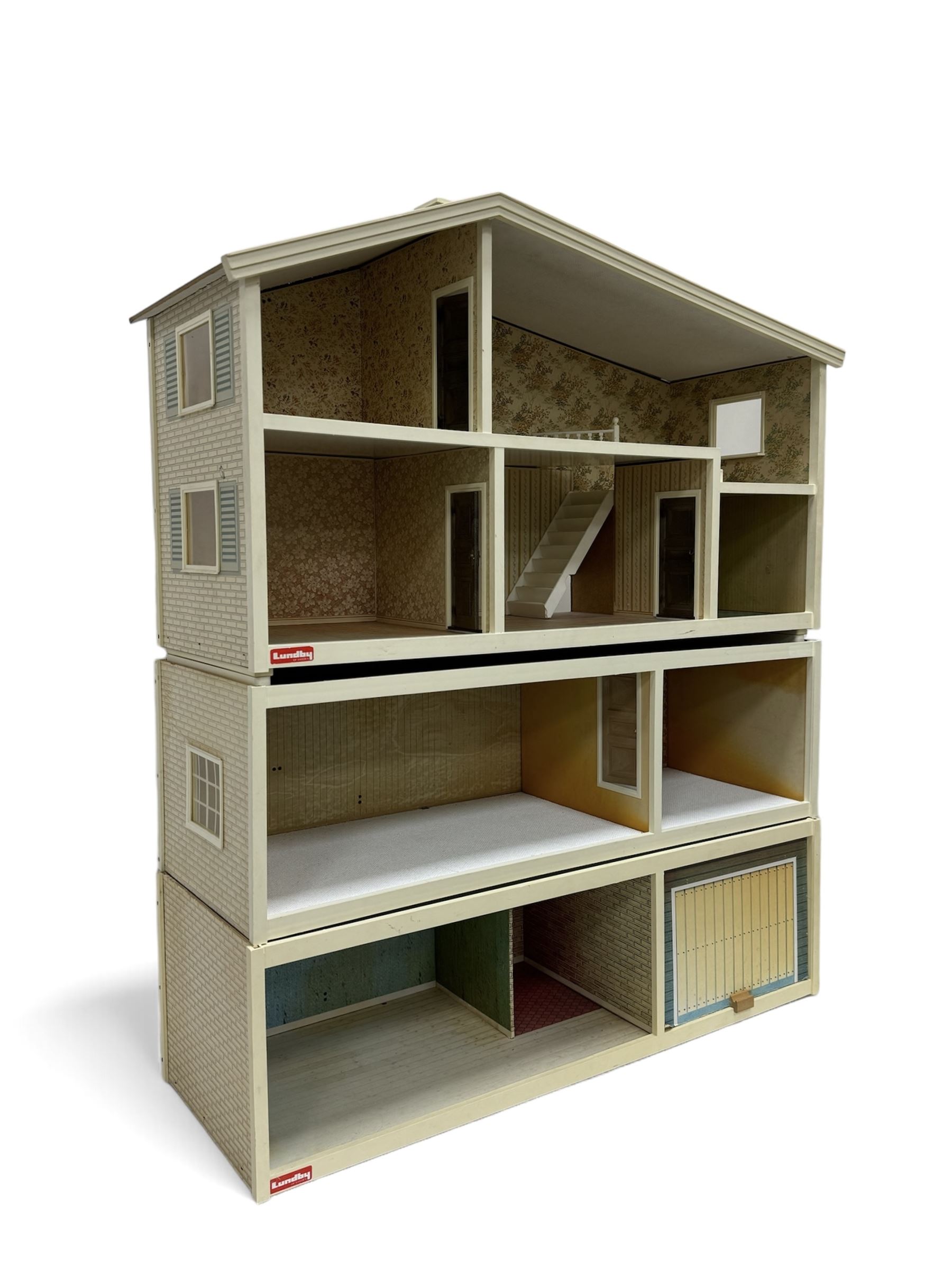 Swedish Lundby four-storey dolls house and garage, with an assortment of dolls house furniture and accessories, dolls house H84cm