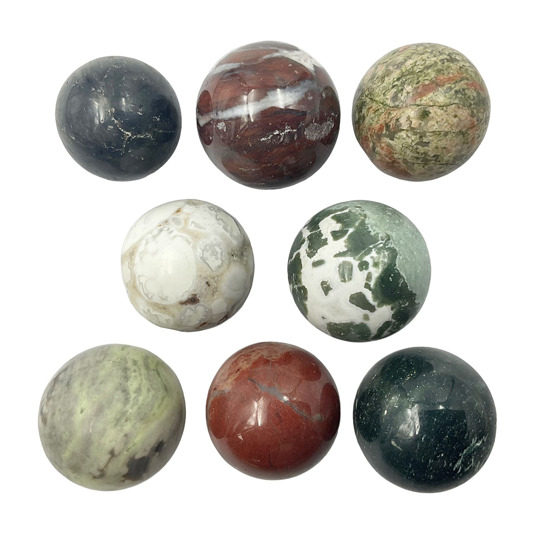 Eight mineral specimens spheres, comprising jasper red, spotted agate, unakite, sardonyx, petrified wood, Serpentine, Larvikite and green Aventurine 