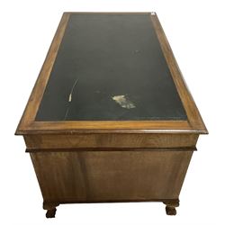 Georgian design twin pedestal desk, rectangular top with green leather inset, fitted with nine drawers, on cabriole supports with ball and claw feet 