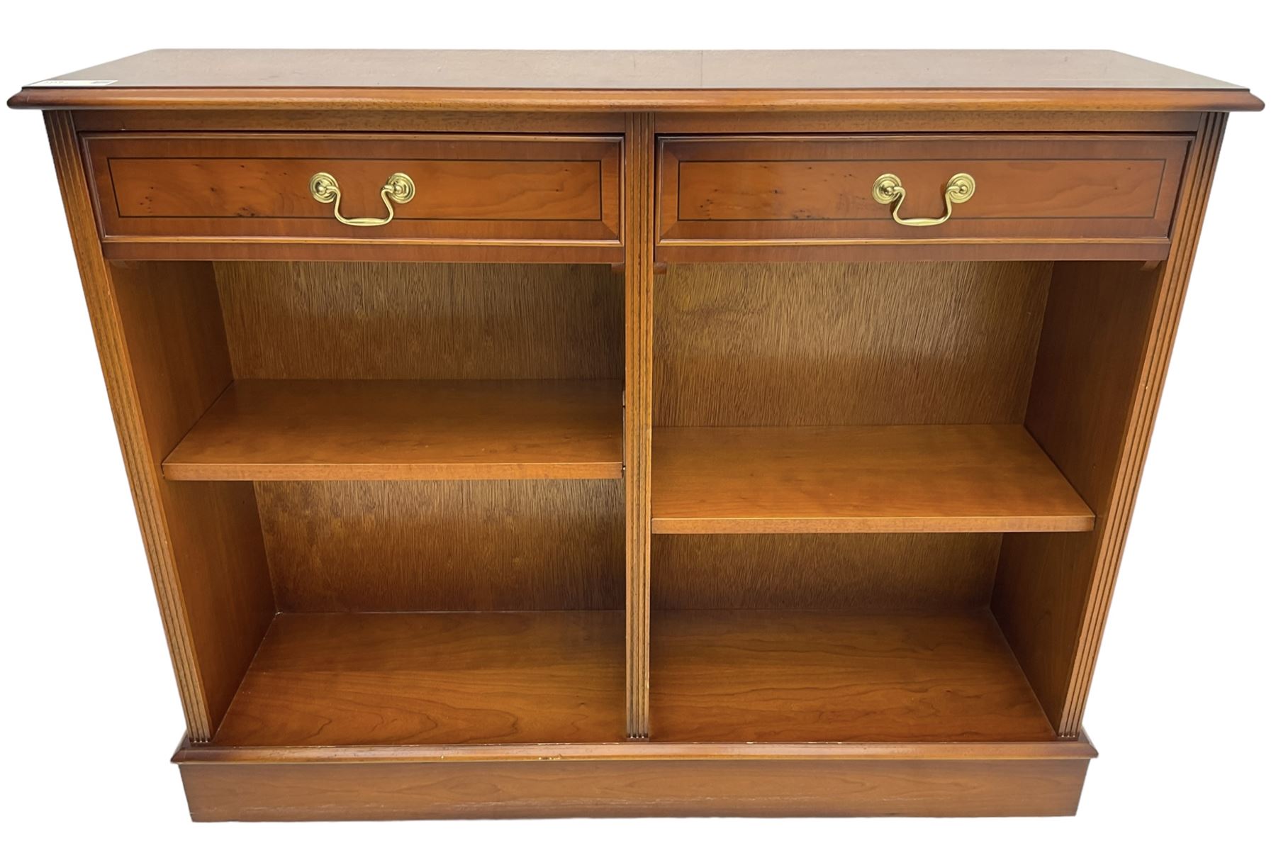 Georgian design yew wood open bookcase, rectangular moulded top over two drawers and two adjustable shelves, on moulded plinth base 