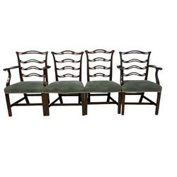 Set of twelve (10+2) Chippendale revival stained beech dining chairs, pierced waived ladder backs with over-stuffed over seats, on square moulded supports joined by stretchers