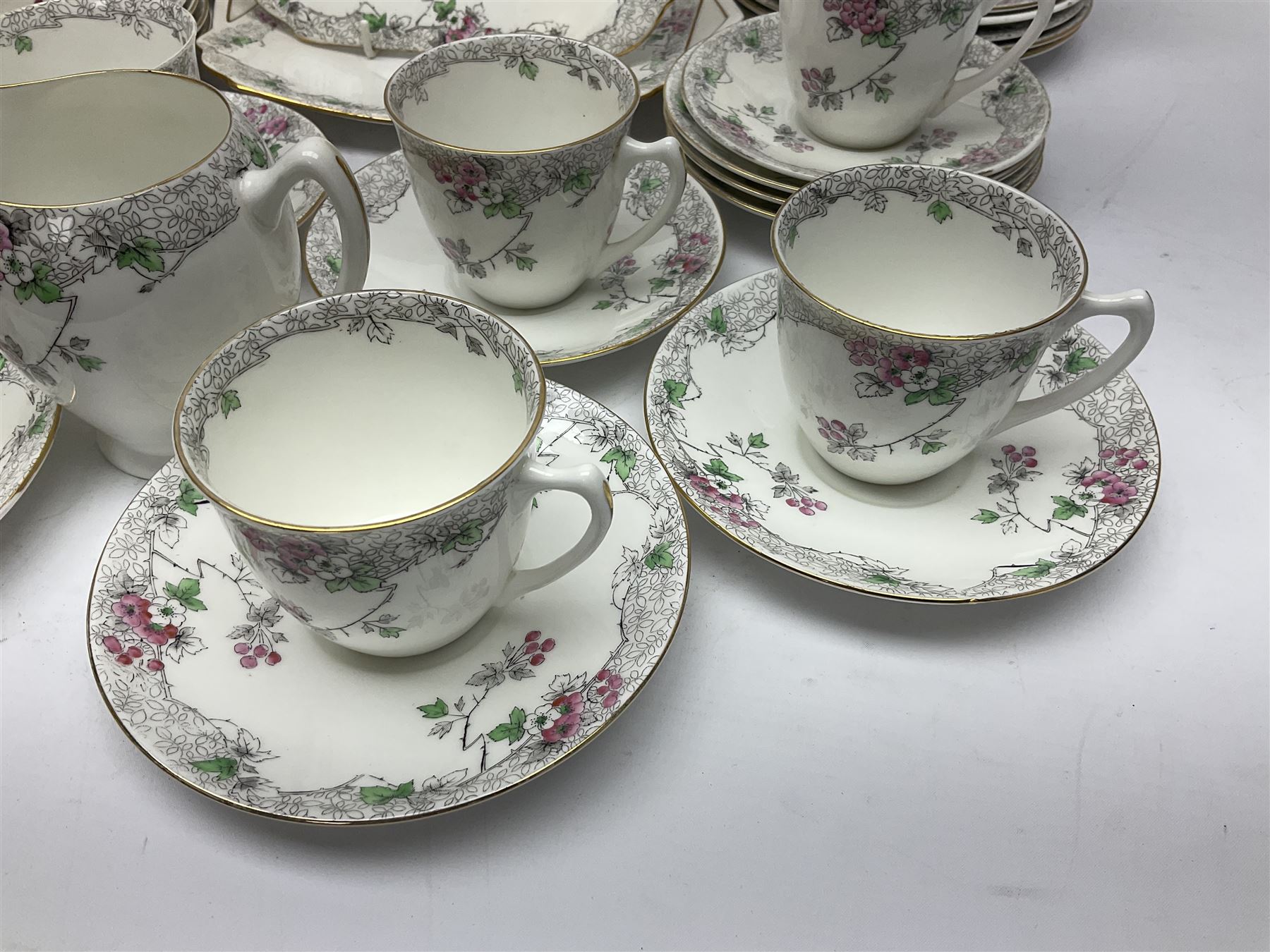 Shelley Bramble Rose pattern tea service, comprising milk jug, open sucrier, ten cups and twelve saucers, twelve dessert plates and two cake plates (38)