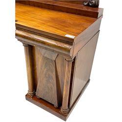 Victorian mahogany reverse break-front sideboard, raised shaped back with central carved shell cartouche and extending foliage decoration, fitted with three drawers over two cupboards, enclosed by two doors with applied faceted mounts and turned columns, on plinth base 