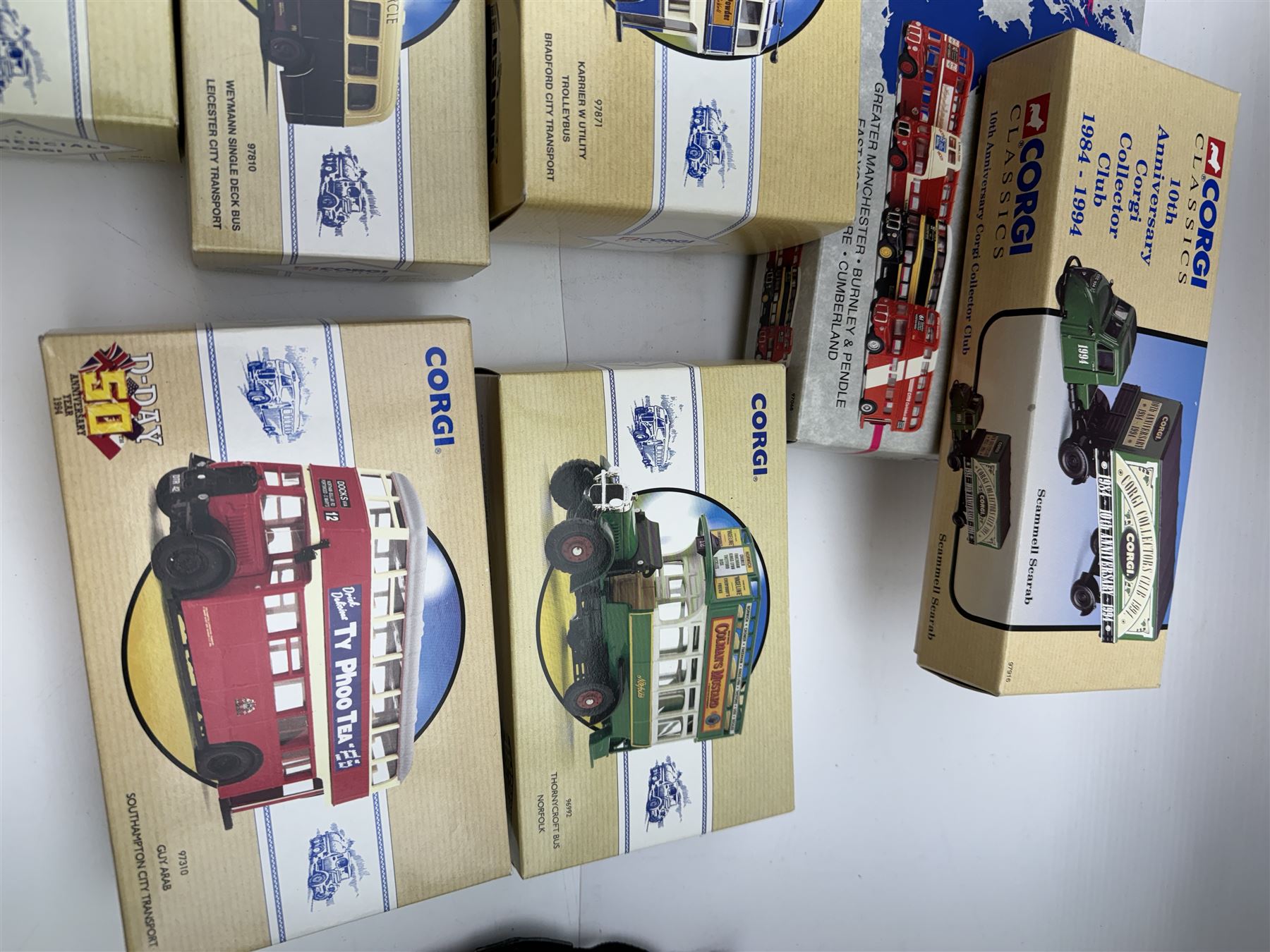 Fifteen limited edition Corgi Classic Public Transport vehicles, together with a 10th Anniversary Corgi Collector Club Scammell Scarab, Routemasters in Exile The North four bus collection and a Classic Commercials Bedford OB Edinburgh, all boxed with certificates (18)