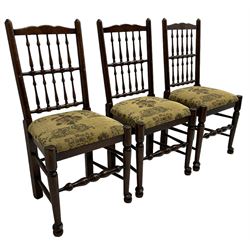 Set of six (4+2) 20th century oak spindle back dining chairs, with upholstered drop-on seat cushions, turned supports joined by turned stretchers