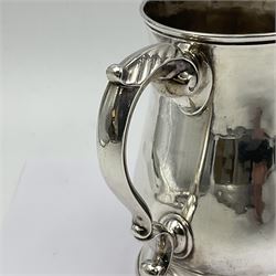 George II silver tankard, of waisted baluster form with acanthus capped C scroll handle, the body engraved with a lion rampant, upon a circular spreading foot, hallmarked Gabriel Sleath & Francis Crump, London 1754, H13cm