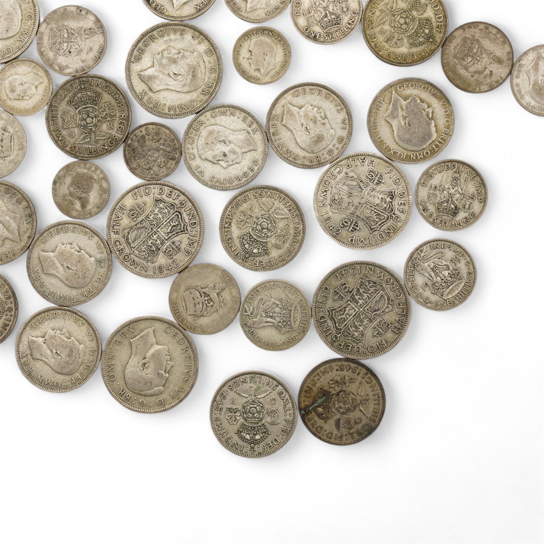 Approximately 610 grams of Great British pre 1947 silver coins, including sixpences, shillings, two shillings or florins, halfcrowns etc