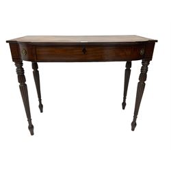 Early 19th century mahogany breakfront side table, the moulded top over single frieze drawer, on turned and reeded supports