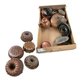 Collection of copper jelly moulds, copper hot water bottle and other metal ware 