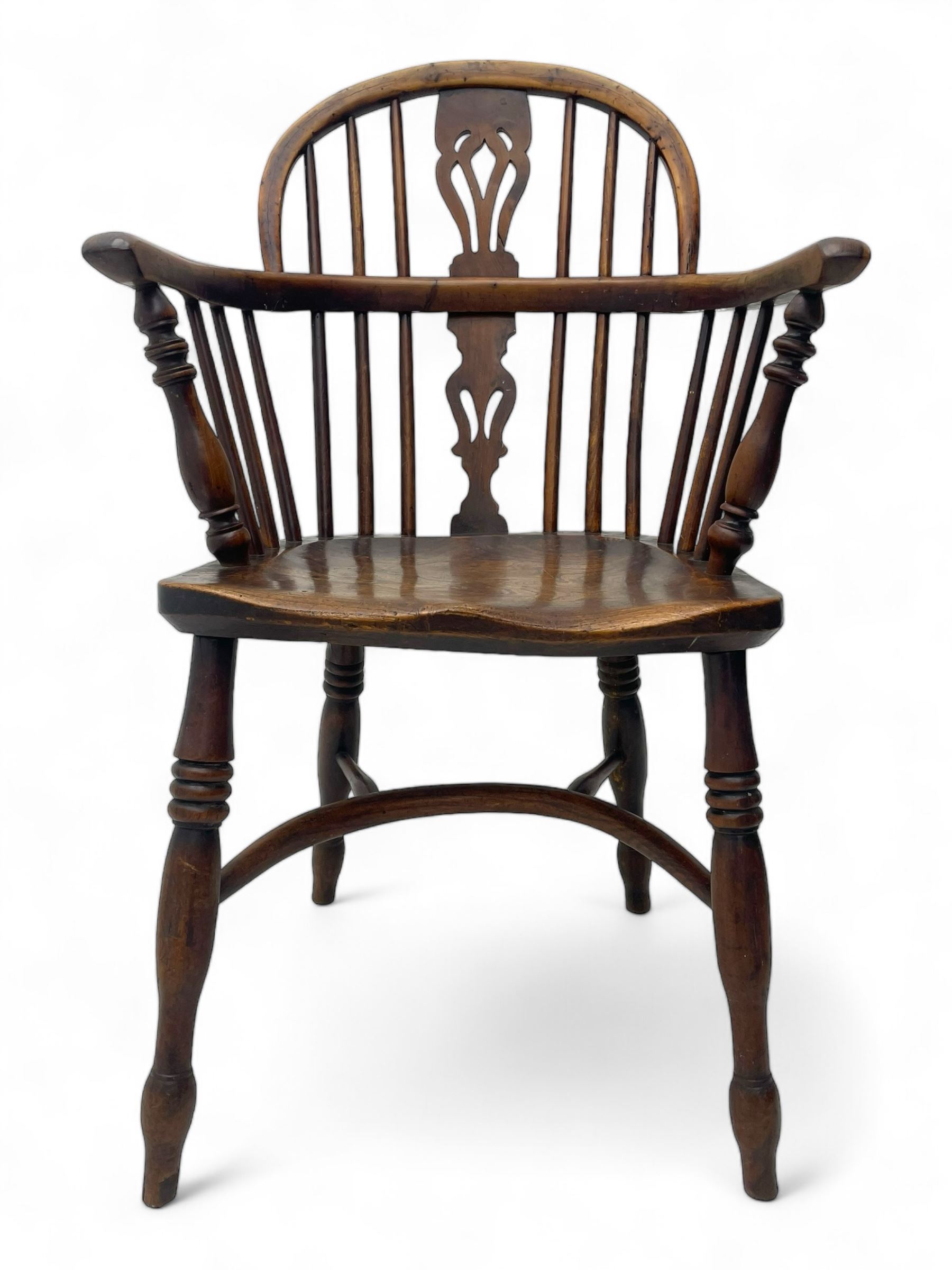 19th century yew wood and elm Windsor armchair, low double hoop stick and pierced splat back, dished seat on turned supports united by crinoline stretchers