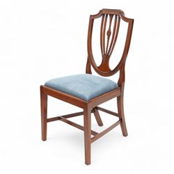 Set of twelve (10+2) Hepplewhite Revival mahogany dining chairs, moulded shield back with satinwood band, drop-in seat upholstered by Peter Silk of Helmsley, on square tapering supports united by H-stretchers 