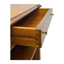 Figured walnut open bookcase, moulded top over two drawers and two shelves, on plinth base 