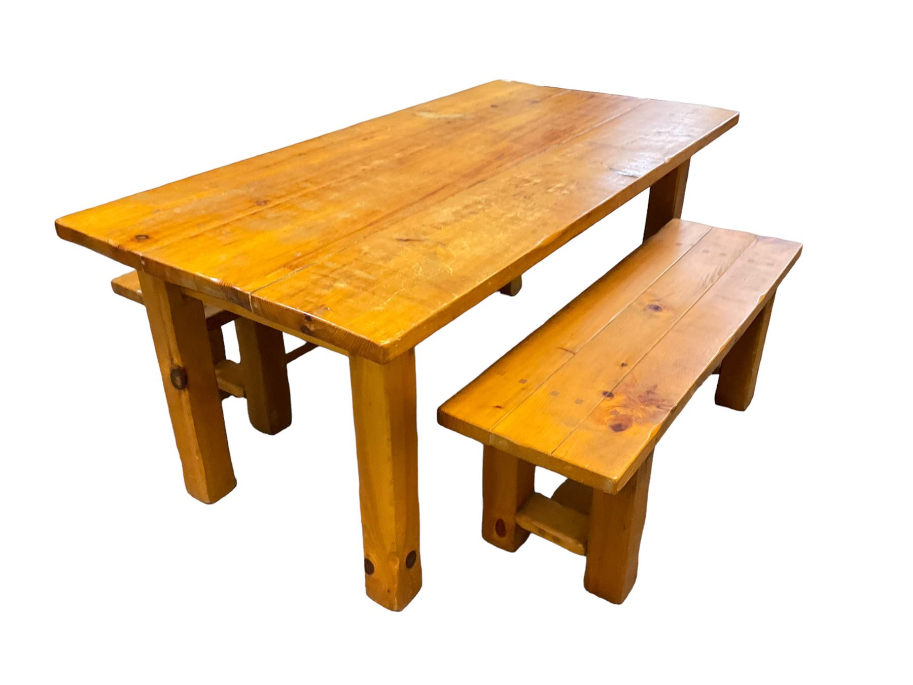 Pine dining table, rectangular plank top on square supports (181cm x 91cm, H80cm); together with two benches (133cmx 41cm, H47cm)