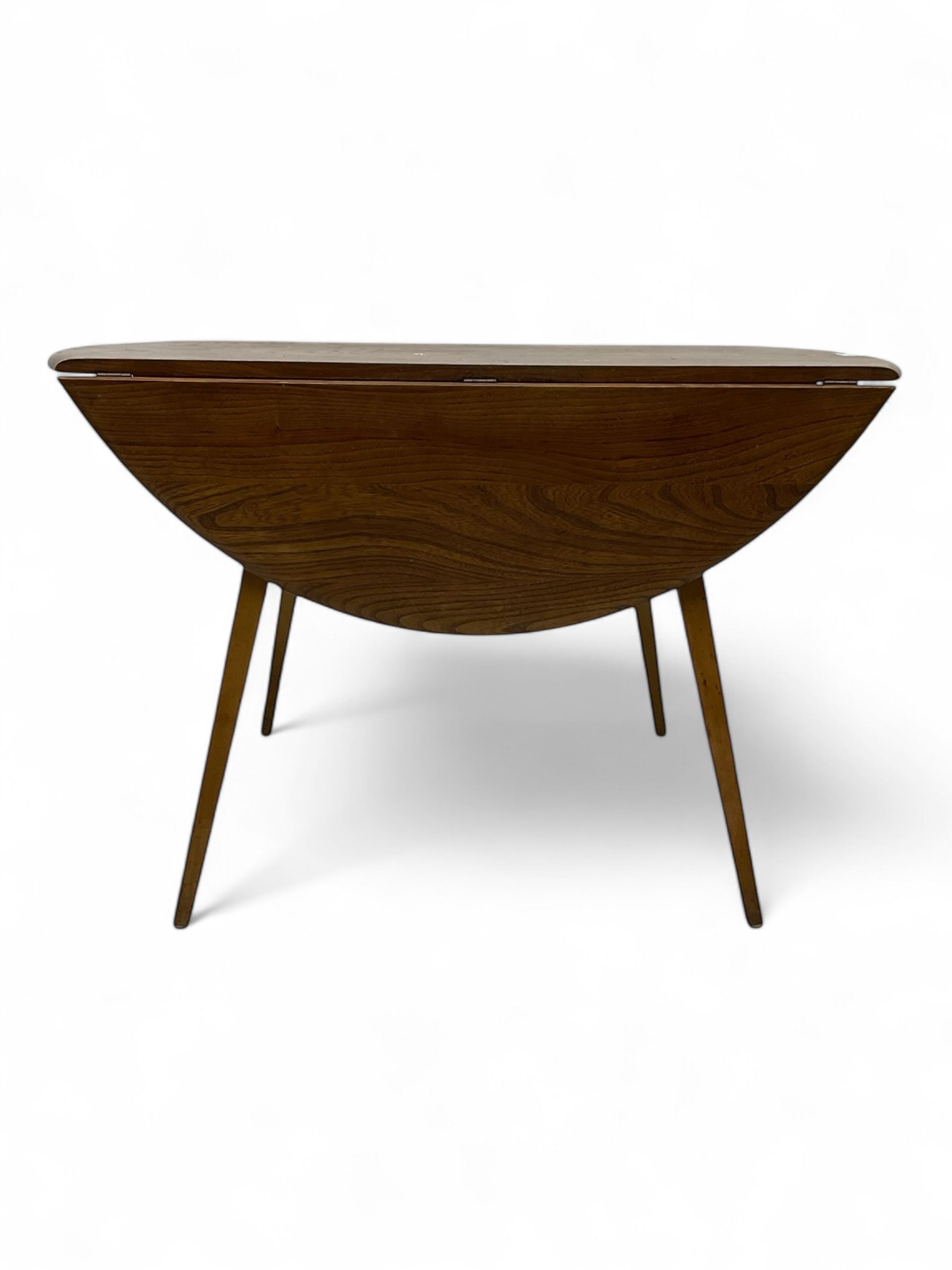 Lucian Ercolani for Ercol - 1960s elm and beech dining table, drop-leaf oval top, on splayed square tapering supports