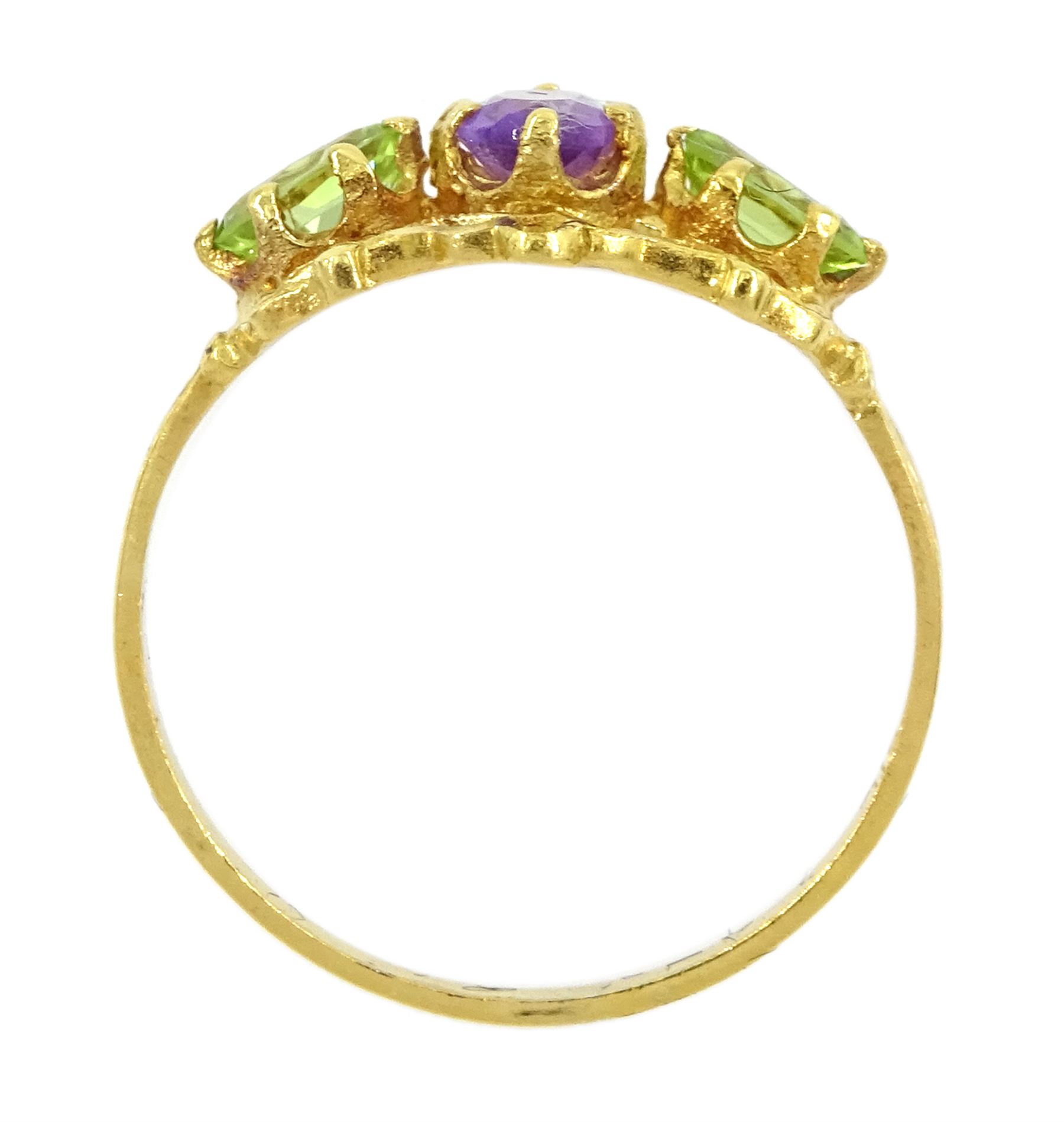 Silver-gilt three stone peridot and amethyst ring, stamped Sil