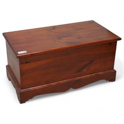 Stained pine blanket box, enclosed by hinged lid, moulded plinth base 