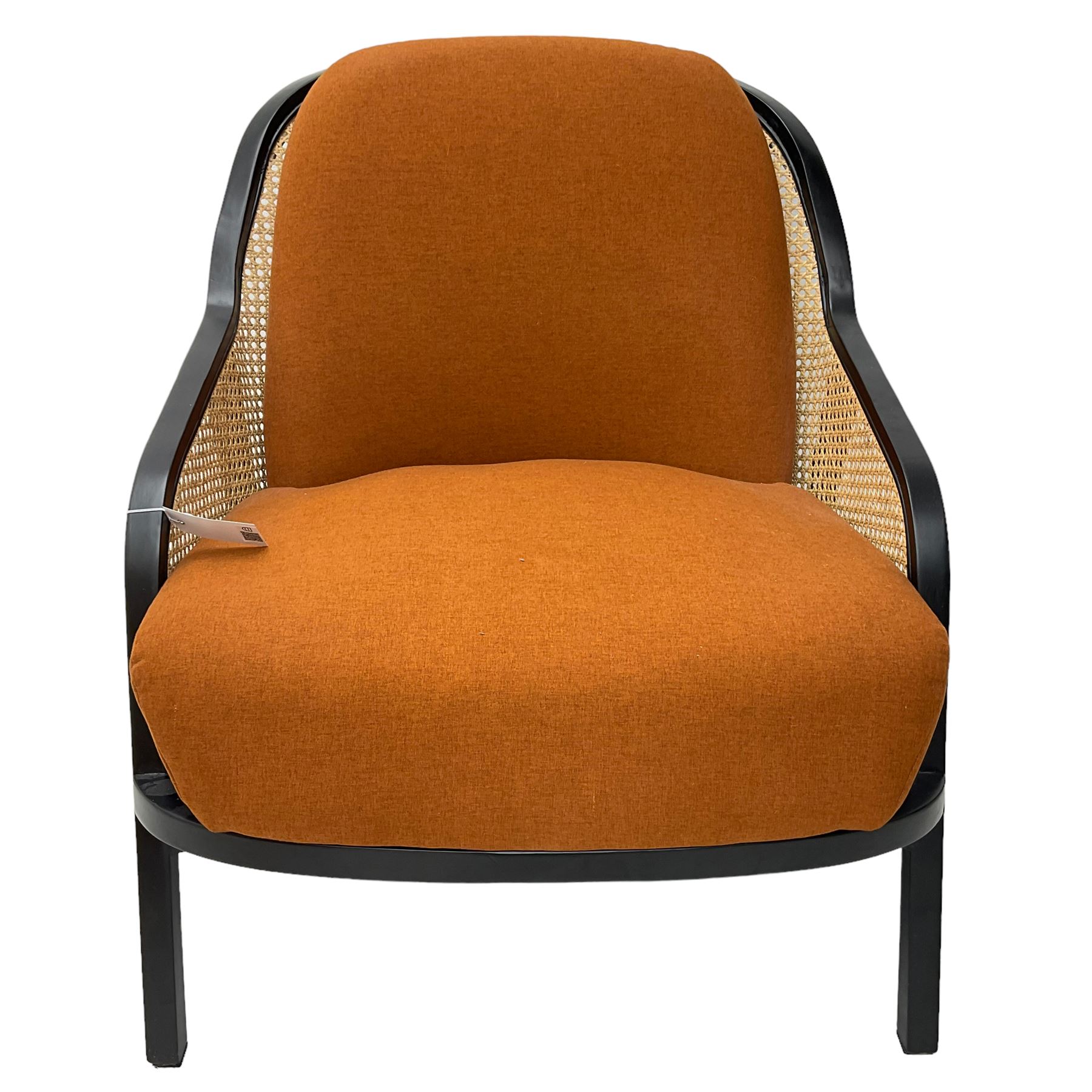 Contemporary MADE Anakie armchair, black lacquered frame with cane backrest, orange fabric upholstered seat and back cushion, sloped armrests, on splayed supports