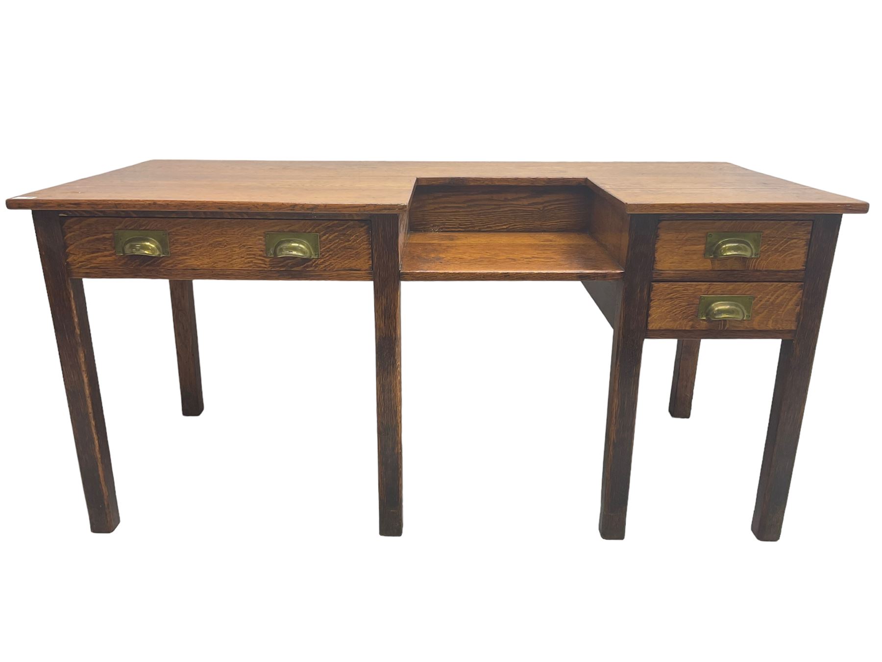 Early 20th century oak clerks desk, fitted with drop centre and drawers, on square supports