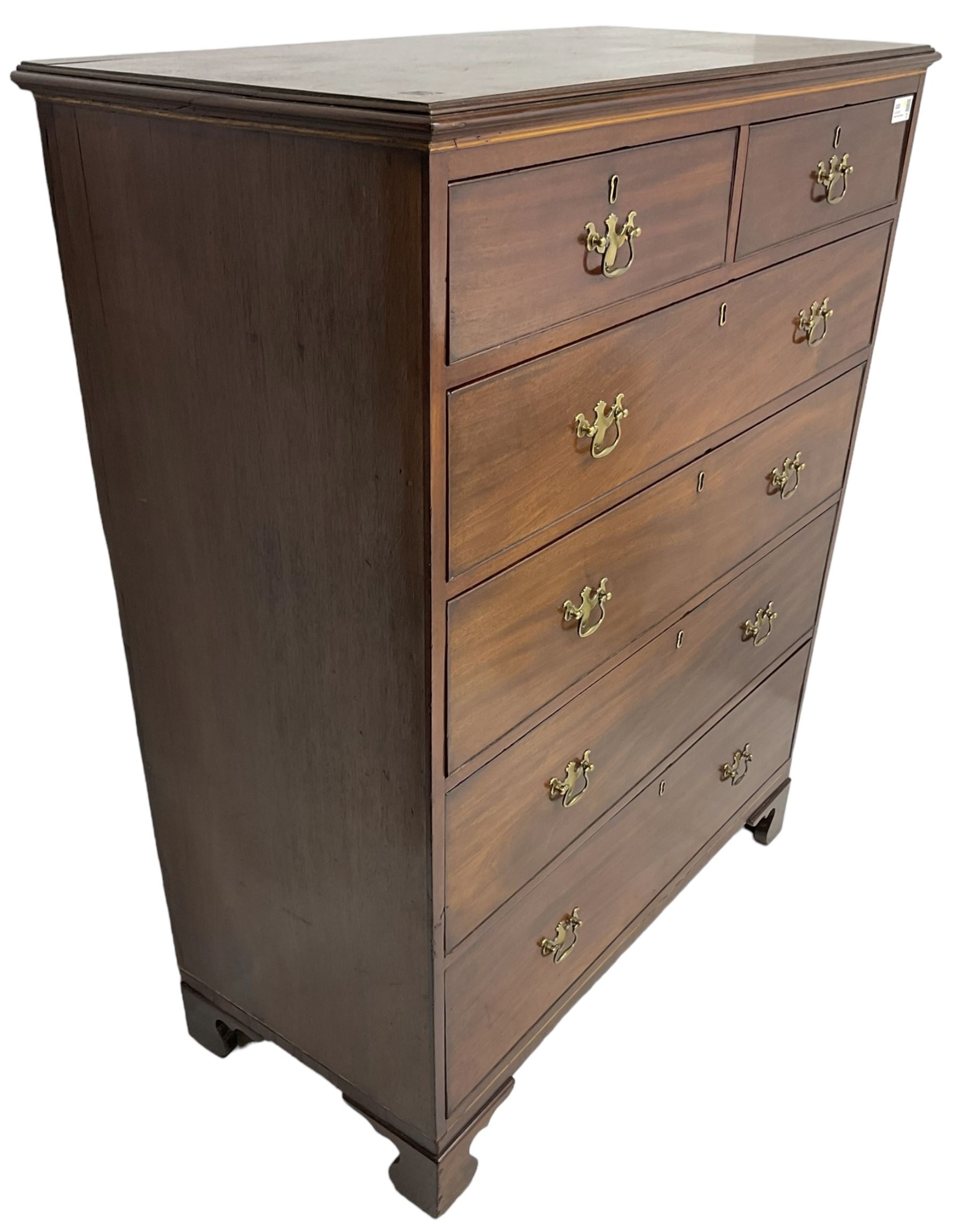 George III mahogany straight-front chest, rectangular top with reed moulded edge, fitted with two short over four long graduating cock-beaded drawers, on bracket feet