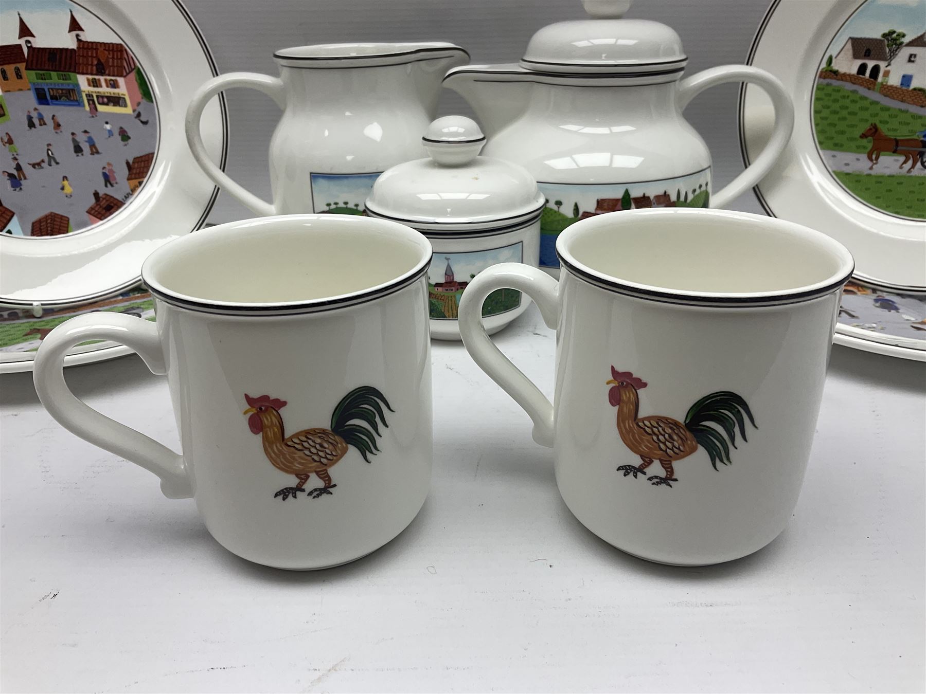 Villeroy and Boch Naif pattern tea service, comprising teapot, jug, covered sucrier, two mugs, two breakfast bowls and four side plates (11)