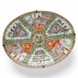 Early 20th century Chinese Canton famille rose oval platter, decorated with panels of figu...