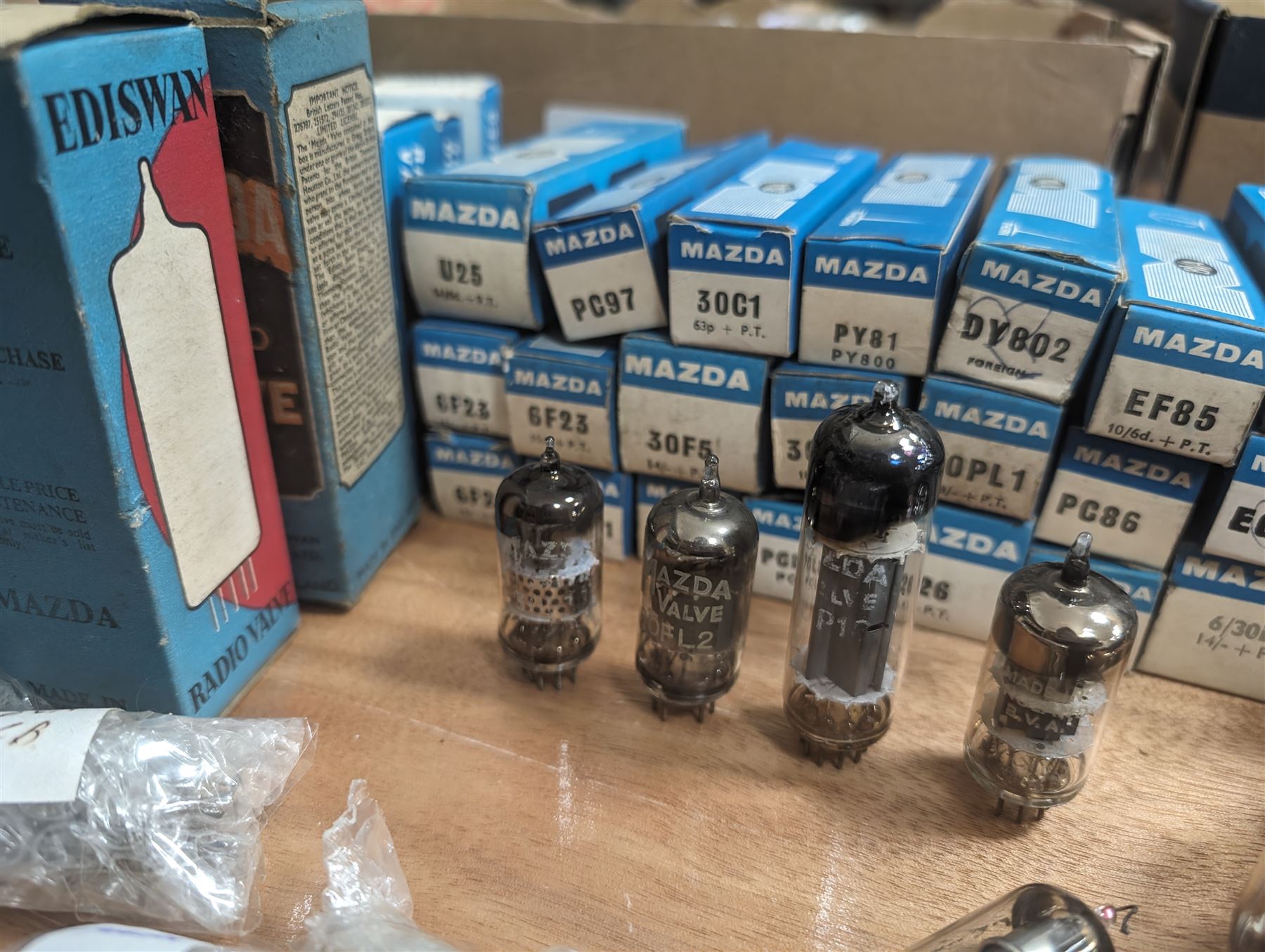 Large collection of Mazda thermionic radio valves/vacuum tubes, including boxed examples and loose bubble wrapped and identified examples