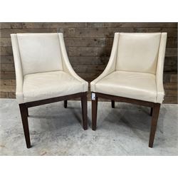 28 x walnut framed dining chairs, upholstered in beige leather