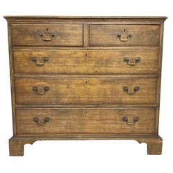 Early 20th century Georgian design oak chest, fitted with two short over three long drawers, lower moulded edge over bracket feet