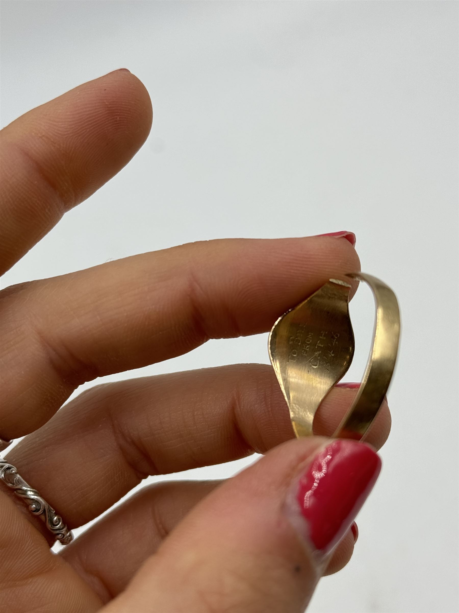 9ct gold signet ring and two 9ct gold cased wristwatches on gilt straps